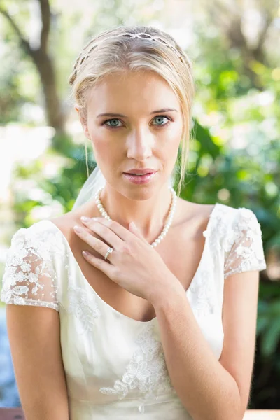 Blonde bride in a veil looking to camera — Stock Photo, Image