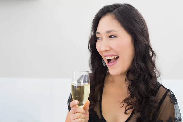 Beautiful young woman with champagne — Stock Photo, Image