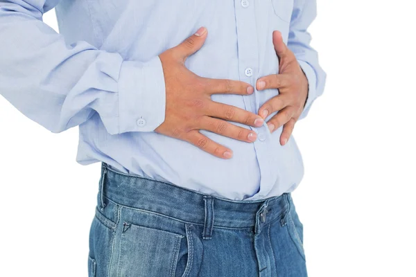 Primer plano sección media de un hombre casual con dolor de estómago — Foto de Stock