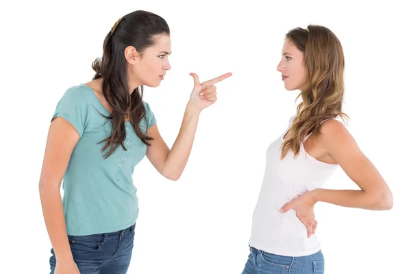 Angry young female friends having an argument Royalty Free Stock Photos