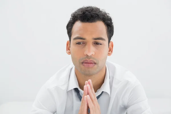 Close-up of a thoughtful young businessman — Stock Photo, Image