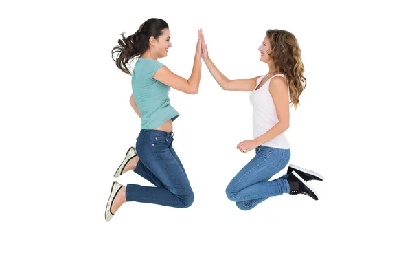 Happy young female friends playing clapping game — Stock Photo, Image