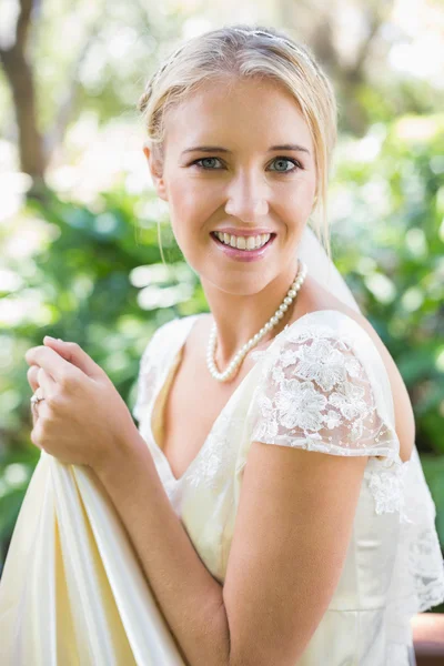 Blonde bride in a veil looking to camera — Stock Photo, Image