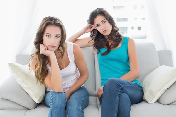 Unhappy friends not talking after argument at home — Stock Photo, Image