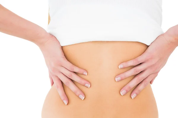 Mid section of a woman suffering from back pain — Stock Photo, Image