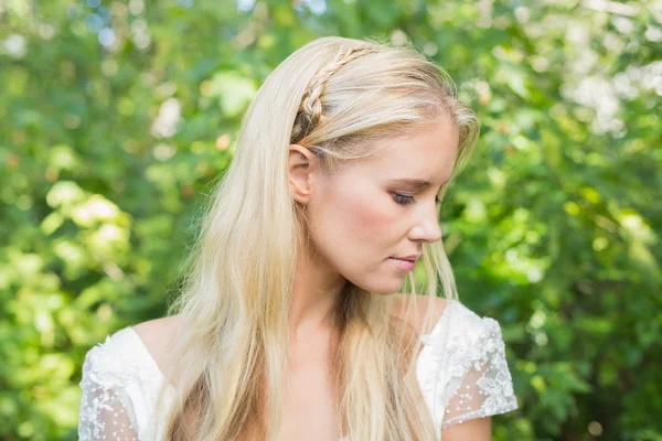 Blonde bride looking peaceful — Stock Photo, Image