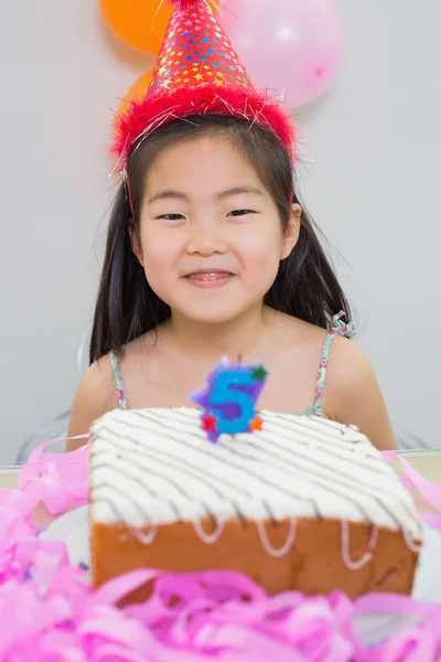 Smiling little girl at her birthday party — Stock Photo, Image