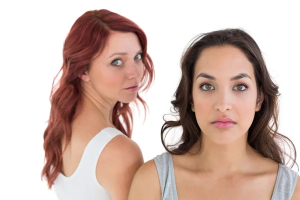 Unhappy young female friends not talking after argument — Stock Photo, Image