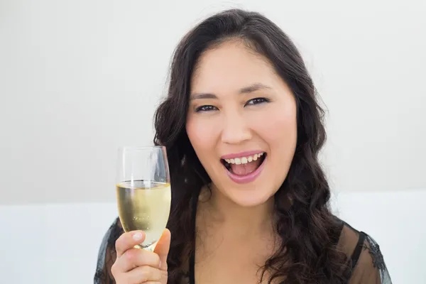 Portrait of a beautiful young woman with champagne — Stock Photo, Image