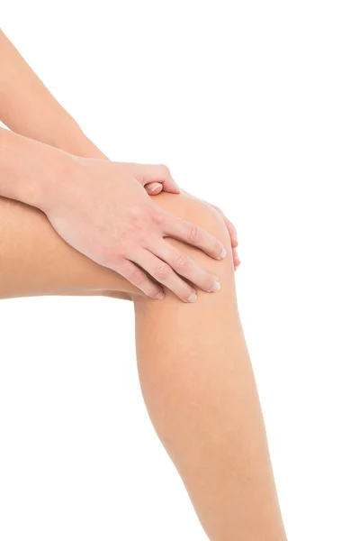 Close-up mid section of a woman with knee pain — Stock Photo, Image