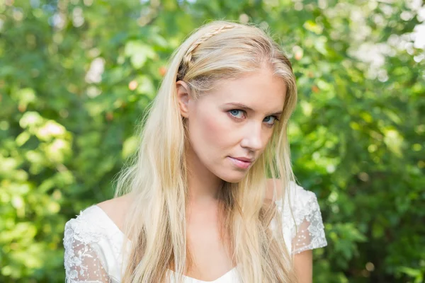 Blonde bride looking peacefully at camera — Stock Photo, Image