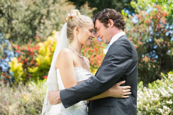 Pretty wife touching noses with new husband — Stock Photo, Image