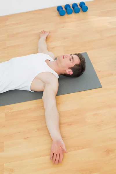 High angle view of a young man relaxing with eyes closed — Stock Photo, Image