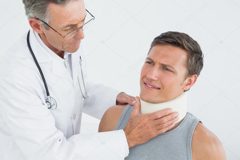Doctor listening to patient with concentration