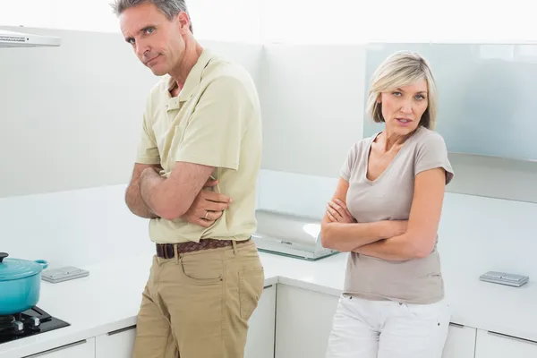 Angry couple after a fight in kitchen — Stock Photo, Image