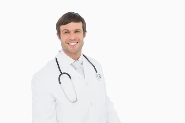 Portrait of a smiling confident male doctor — Stock Photo, Image