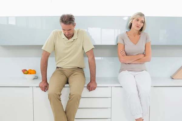 Angry couple after a fight in kitchen — Stock Photo, Image