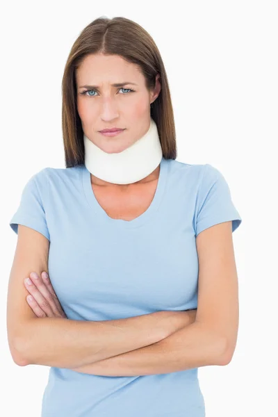 Portrait of a young woman wearing cervical collar — Stock Photo, Image