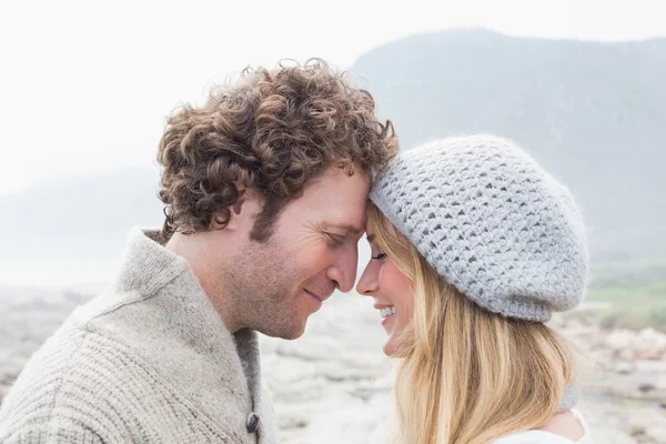 Close-up side view of a romantic young couple together — Stock Photo, Image