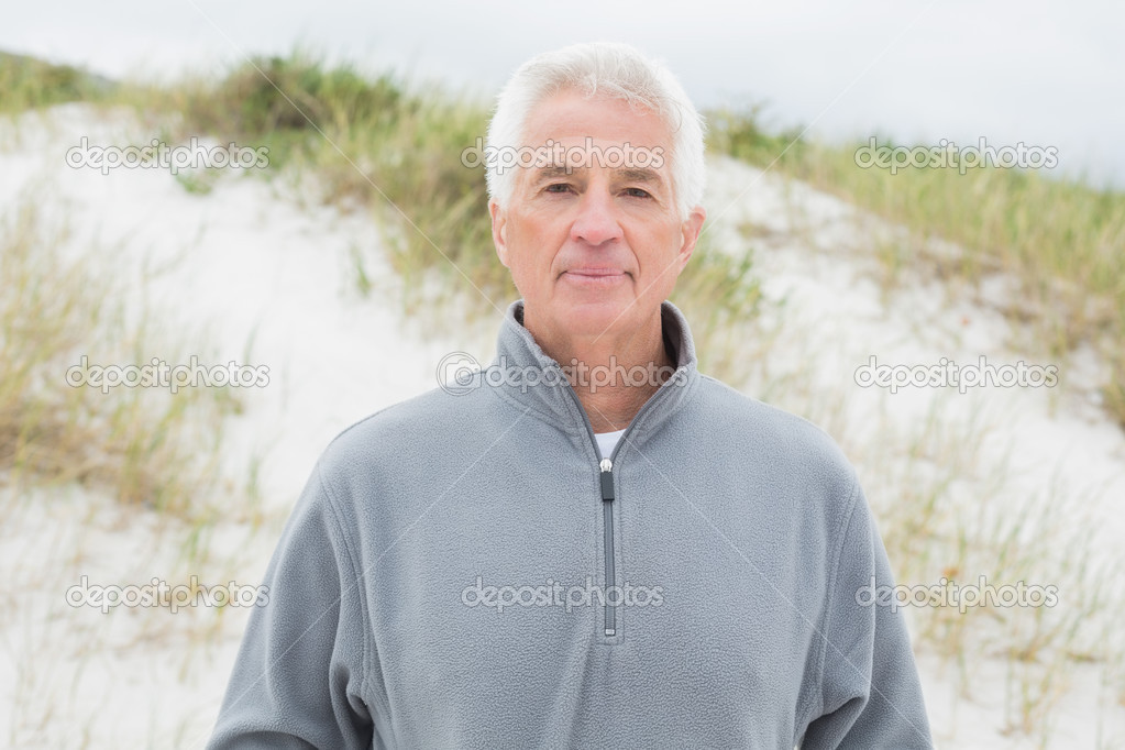 Portrait of a handsome senior man at beach