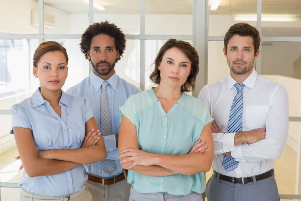 Portret van ernstige zakenmensen in office — Stockfoto