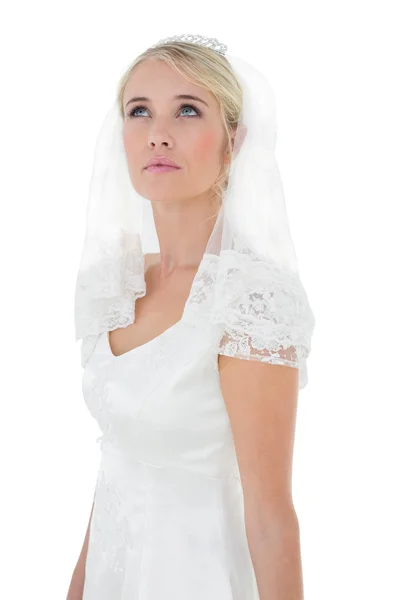 Bride looking up over white background — Stock Photo, Image