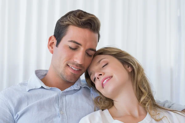 Close-up of a loving young couple with eyes closed — Stock Photo, Image