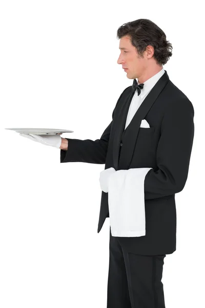 Server holding tray over white background — Stock Photo, Image