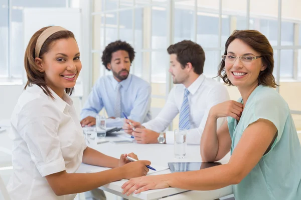 Group of happy business people in meeting at office — Stock Photo, Image