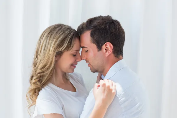 Loving young couple with eyes closed — Stock Photo, Image