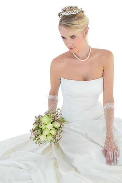 Elegant bride holding flower bouquet — Stock Photo, Image