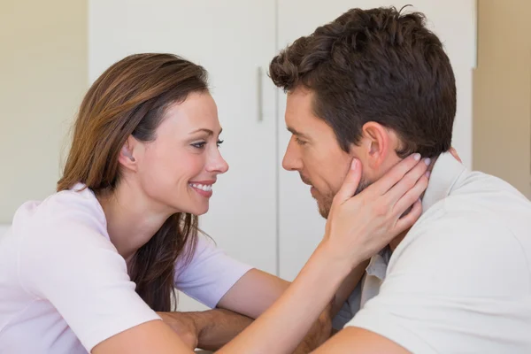 Loving young couple looking at each other — Stock Photo, Image