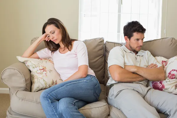 Couple not talking after an argument in living room — Stock Photo, Image