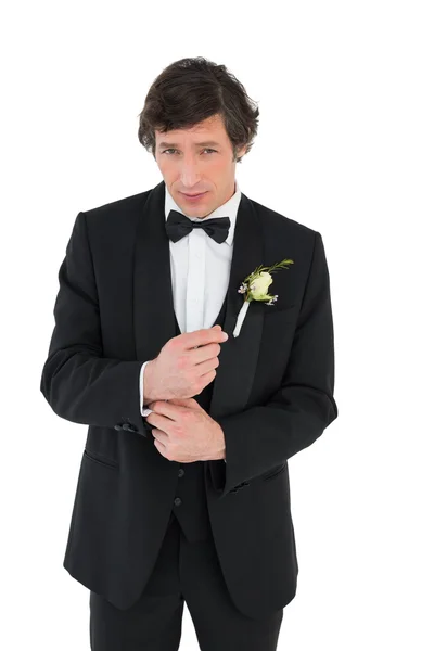 Handsome groom in tuxedo getting ready — Stock Photo, Image