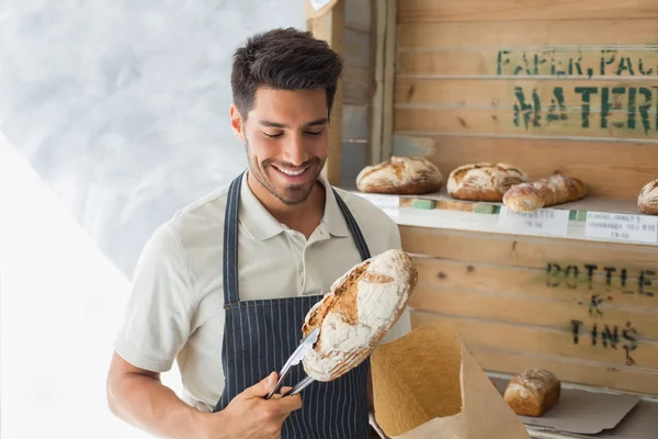 Male cafe owner with sweet food at coffee shop — Stock Photo, Image