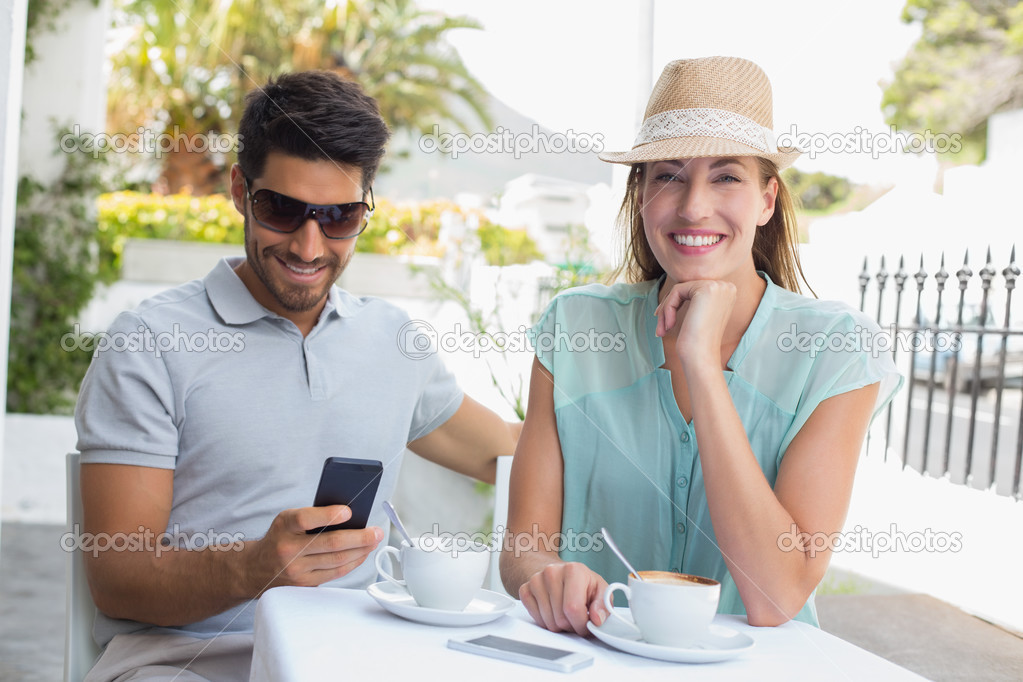 Portrait of a happy couple at coffee shop