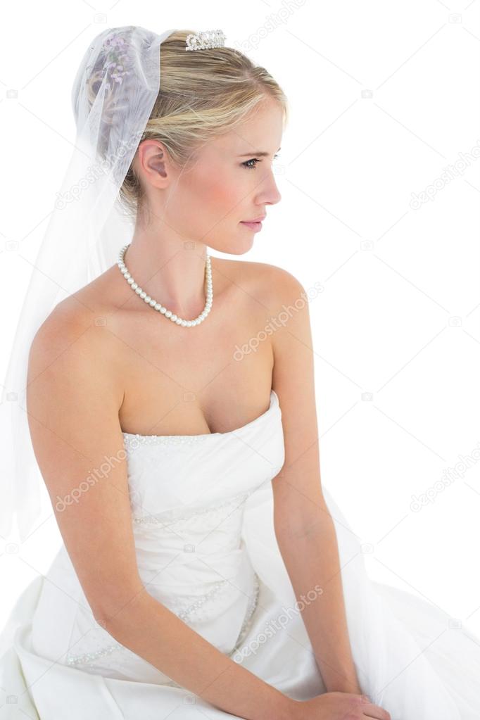 Bride thinking against white background