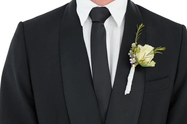 Bräutigam trägt Smoking mit Corsage — Stockfoto