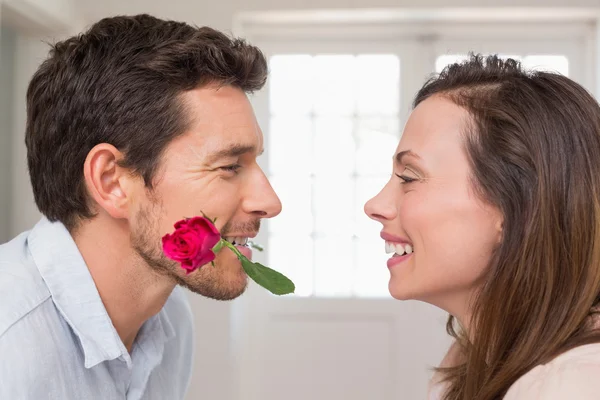 Loving couple looking at each other at home — Stock Photo, Image