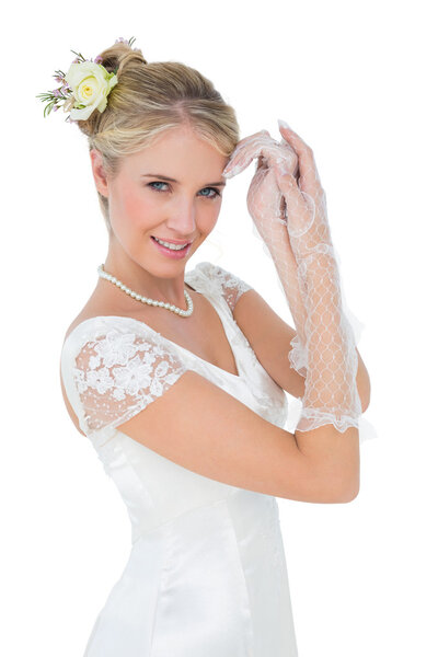 Smiling bride posing over white background Stock Picture