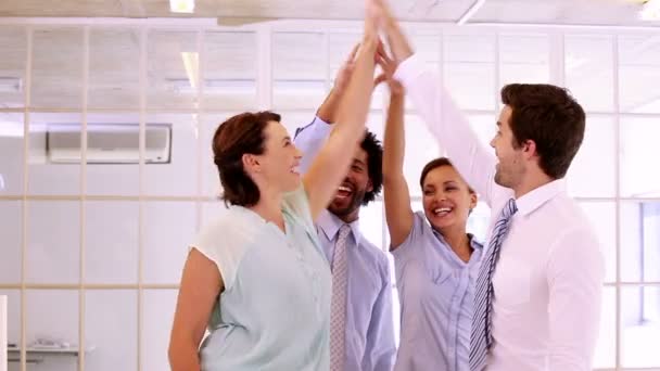 Business team high fiving together — Stock Video