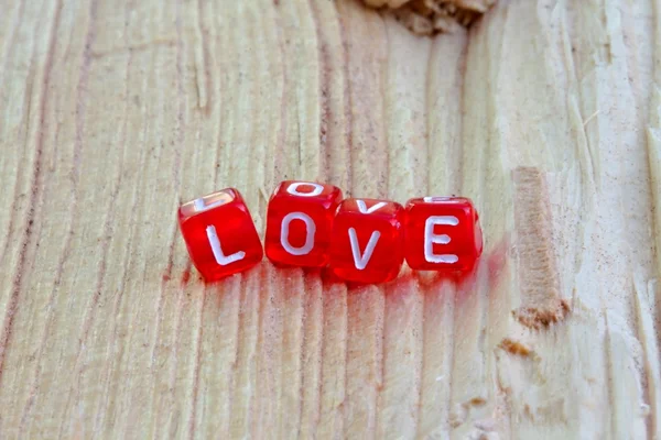 Liefde teken op het hout — Stockfoto