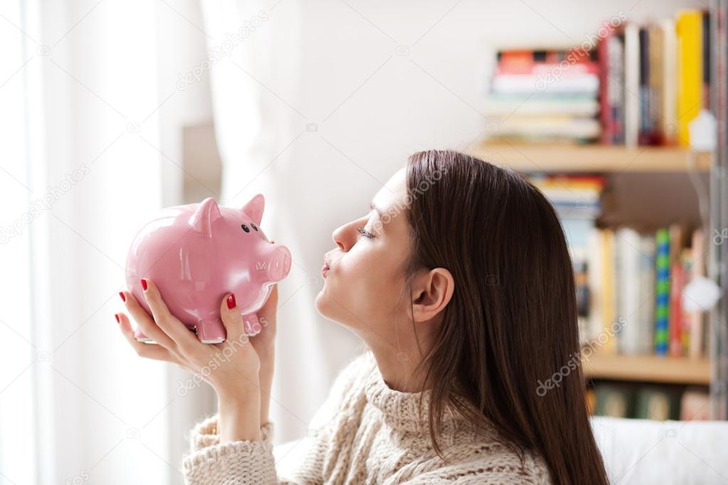 Kissing piggy bank