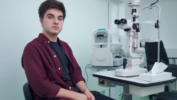 Medium Shot Portrait Young Caucasian Man Sitting Ophthalmologic Clinic Retina — Vídeos de Stock