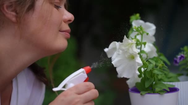 Close Side View Smiling Size Woman Spraying Water White Flower — Video Stock