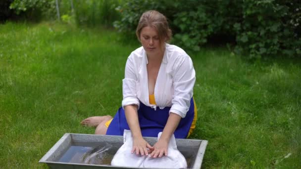 Portrait Size Woman Washing Towel Water Tub Slow Motion Outdoors — Stok video