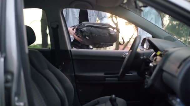 Young Man Sitting Drivers Seat Car Backpack Talking Joyful Woman — Stok Video