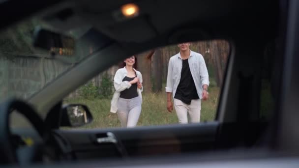 Smiling Couple Walking Forest Car Opening Door Sitting Passenger Seat — Video Stock