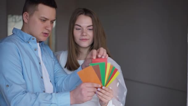 Happy Successful Young Caucasian Couple Choosing Color Walls Standing New — Stock Video