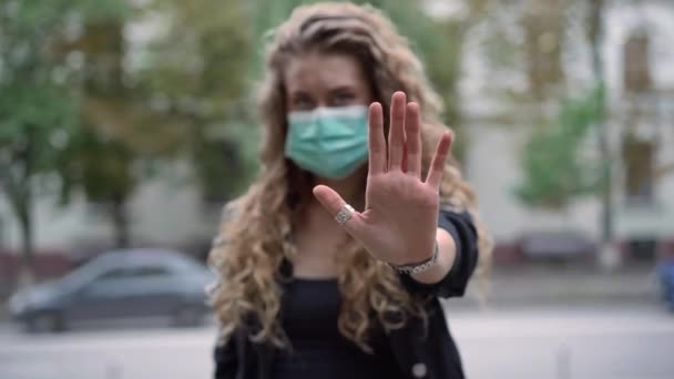 Close Stretched Female Hand Blurred Young Woman Covid Face Mask — Stock Video